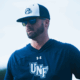 UNF Coach Mike Petroski coaching baseball camps at Harmon Stadium in Jacksonville Florida